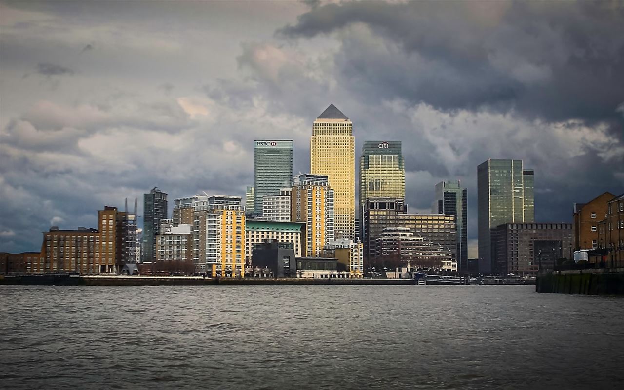 Canary Wharf and London Docklands skyline across the water